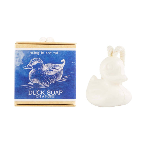 Duck-shaped soap with packaging on a white background