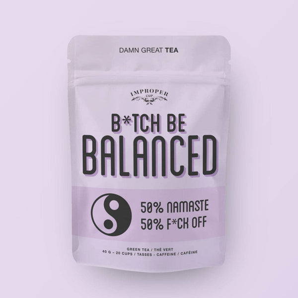 Tea package with text on a light purple background