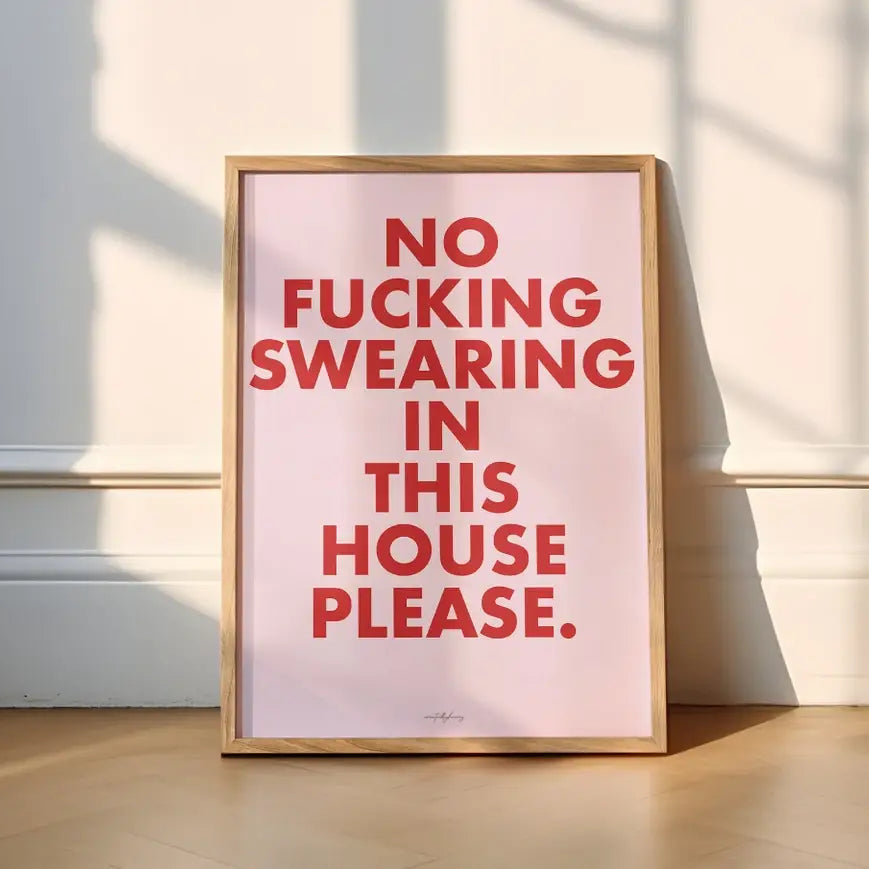 Framed poster with red text on a light background