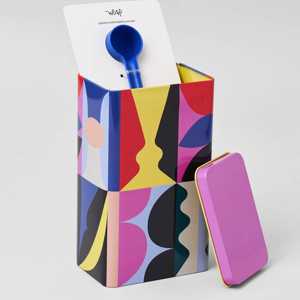 Colorful geometric-patterned box with a blue scoop on a white background