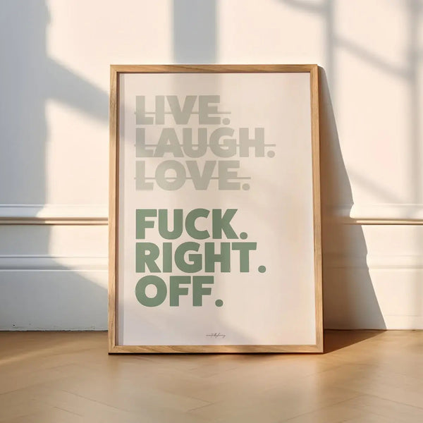 Framed poster with motivational quote on a wall
