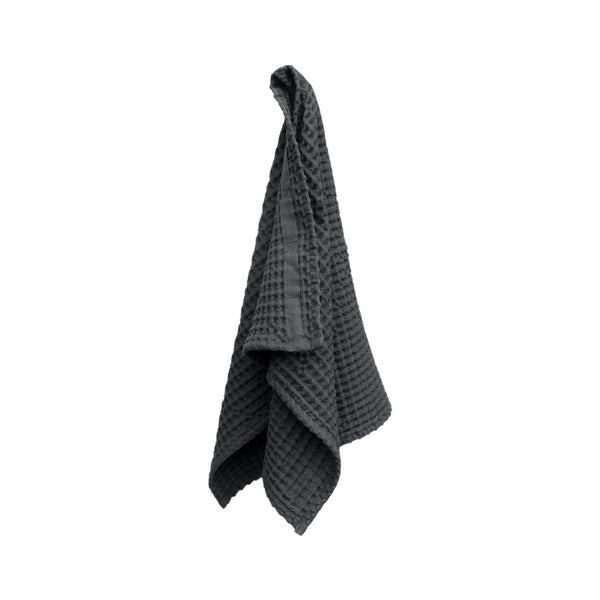 Photo shows big waffle hand towel in dark grey