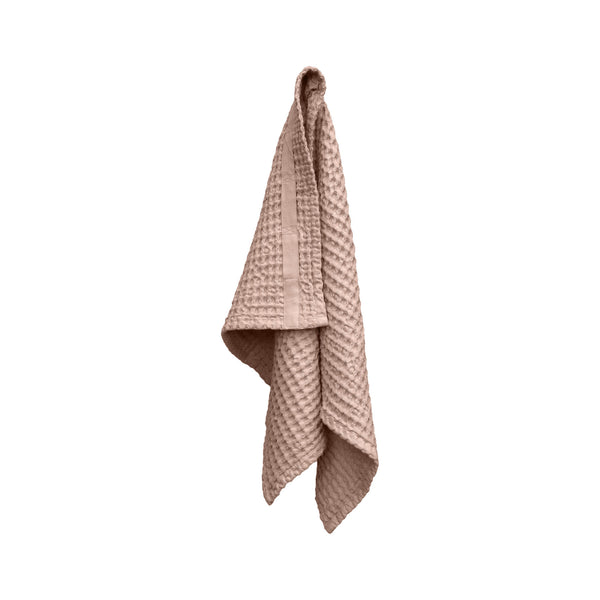 Photo shows big waffle hand towel in pale rose